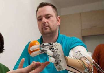 scientists create prosthetic hand that feels in real time