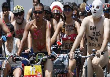 semi nude cyclists in peru campaign for road safety