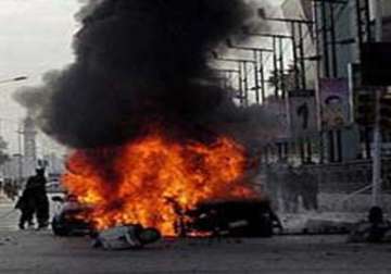 seven killed in peshawar as two suicide bombers attack govt complex
