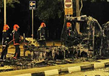 singapore arrests 8 more indians 24 charged for rioting