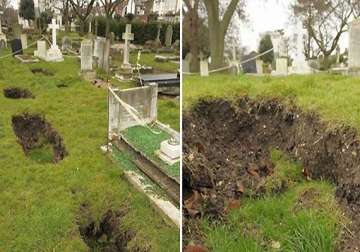 sinkholes threatening dead 50 coffins swallowed in uk graveyard watch pics