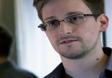 snowden missing julian assange says he is safe in seclusion