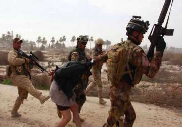 soldiers reportedly executing sunni detainees in iraq