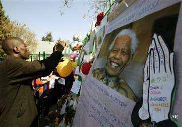 south africa mandela remains critical as family feuds