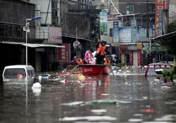 southern china rains kill 55 leave 14 missing