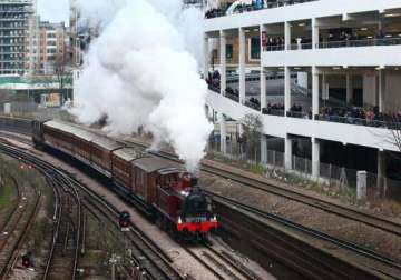 steam train chugs through tube to mark 150th anniversary