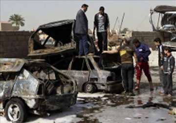 string of morning attacks kill 22 in iraq