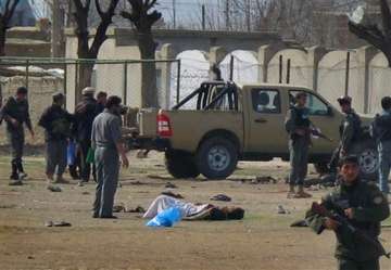 suicide bomber kills 36 near afghan army centre