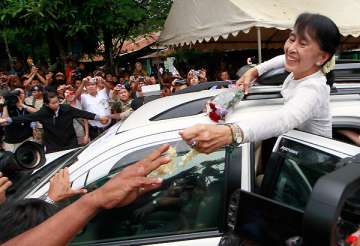 suu kyi returns home after 1st trip in 24 years
