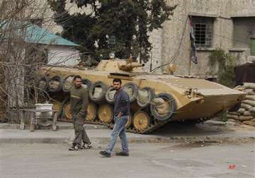 syrian forces mass outside rebel stronghold.