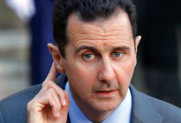 syria massacre carried out by monsters claims assad