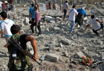 syrian warplanes bomb rebel held town 8 killed