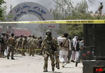 taliban storm afghan hotel killing 18 people
