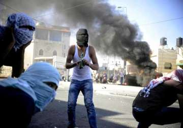 tensions soar in east jerusalem israel moves troops near gaza