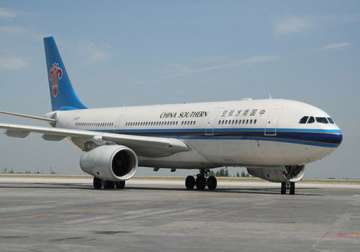 terror threat forces plane to land in china