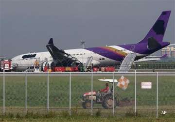 thai airways plane skids off runway 14 passengers hurt