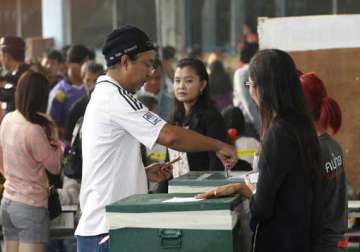 thailand holds polls smoothly in opposition strongholds