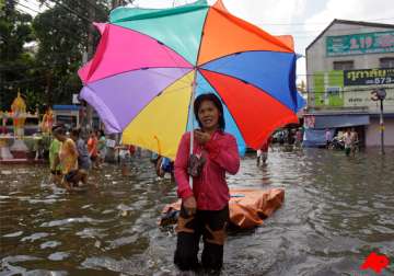 thailand says floods may ease early next month
