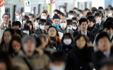 thousands flee fukushima telegraph report