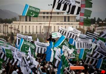 thousands rally in pakistan against cooperation with nato