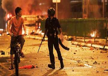 three more indians charged for singapore rioting
