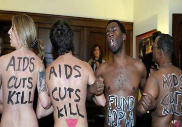 three female aids activists take off clothes in us speaker s office lobby