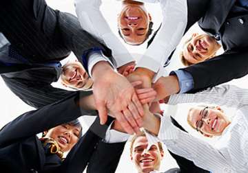 top level teamwork keeps firms buoyant cheerful