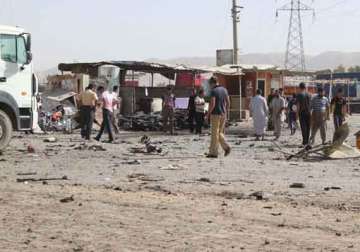 two killed 11 injured in iraq attacks