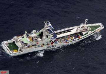 two ships collide off japan 13 fishermen missing