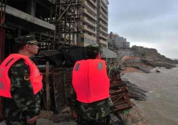 typhoon hits eastern china with strong winds rain