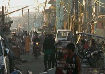 typhoon stricken philippine town starts rebuilding