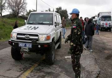 un withdraws foreign staff from syria