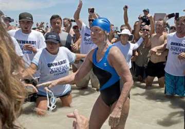 us swimmer diana nyad becomes first person to swim from cuba to florida without a shark cage
