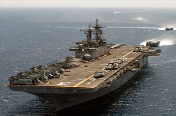 us moves carrier with fighters and marines to libyan shores