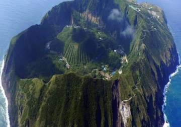 volcanic japanese island hit by series of quakes