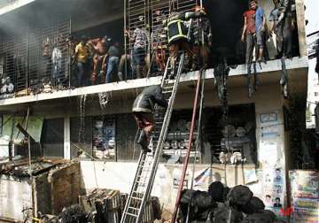 wal mart distances itself from garment factory fire in bangladesh