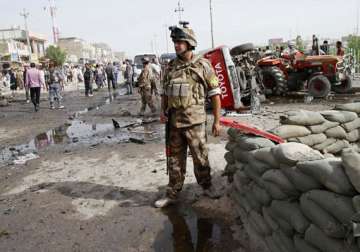 wave of attacks kills at least 57 in iraq