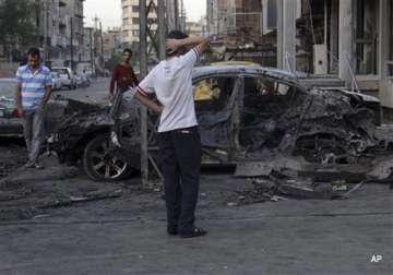 wave of bomb blasts rock iraqi capital killing 30