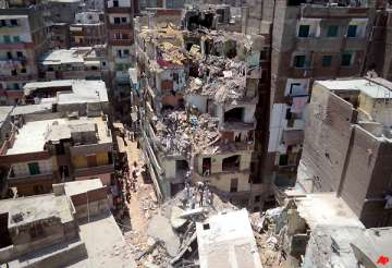10 killed in high rise collapse in egypt