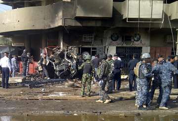 iraq bombs market attacks leave 40 dead