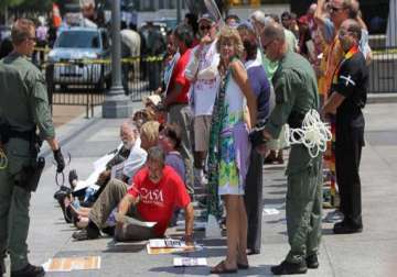 100 immigration activists arrested in front of white house