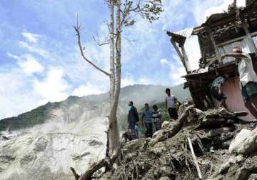 34 killed scores missing in nepal landslide and flood