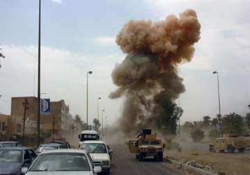 over 60 killed as blasts rip through iraq