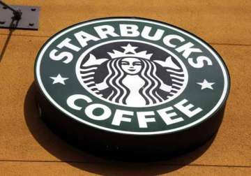 in symbolic move starbucks to open first shop in italy