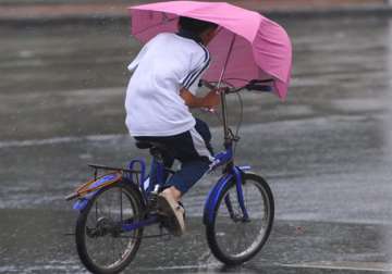 8 000 stranded as storm hits china island