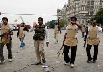 26/11 attacks mumbai court issues non bailable warrants against 12 suspects