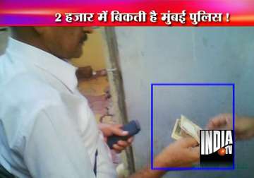 36 mumbai policemen suspended after whistle blower activist shoots video of bribe taking