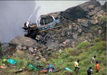 20 die as bus falls into gorge