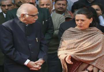 advani apologizes to sonia gandhi on swiss account issue