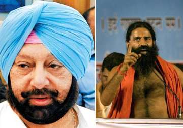 amarinder writes to himachal cm to revoke lease to ramdev